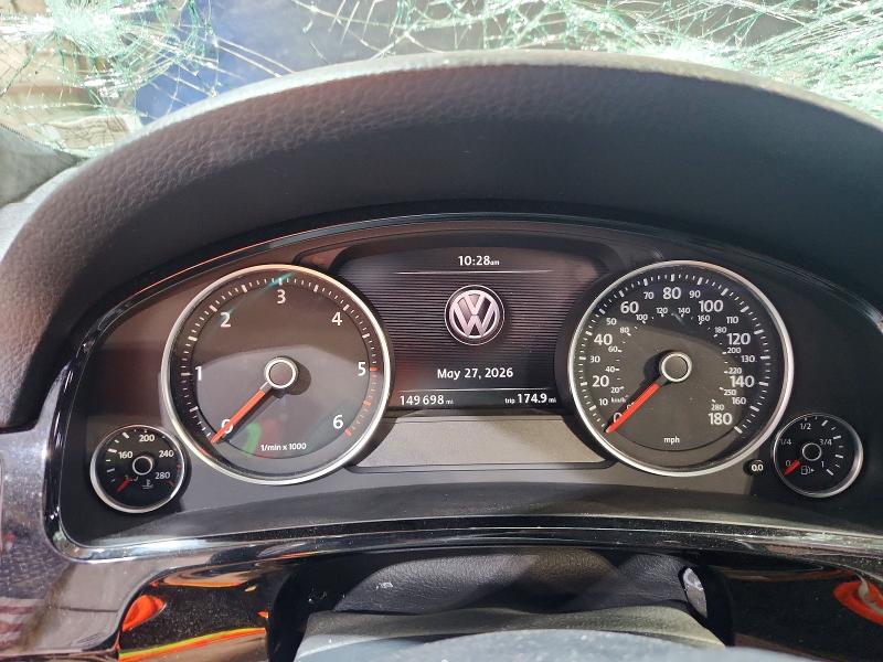 2014 Volkswagen Touareg VIN WVGEP9BPXED013575 COPART salvage auction — HAIL, Mo - Salvage Certificate Of Title, sold $1,550 on 2026-07-28 (photo 9)