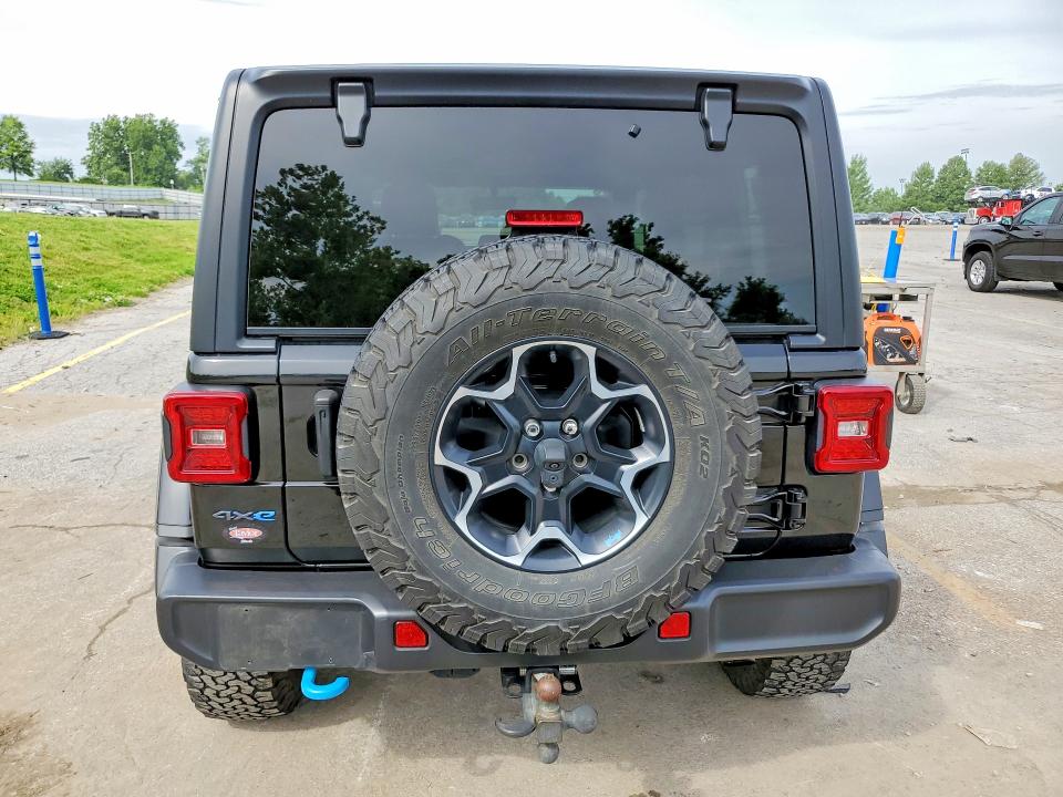 2023 Jeep Wrangler / VIN 1C4JJXR67PW554824 COPART salvage auction — MINOR DENT/SCRATCHES, Mo - Certificate Of Title, sold $24,250 on 2026-07-02 (photo 6)