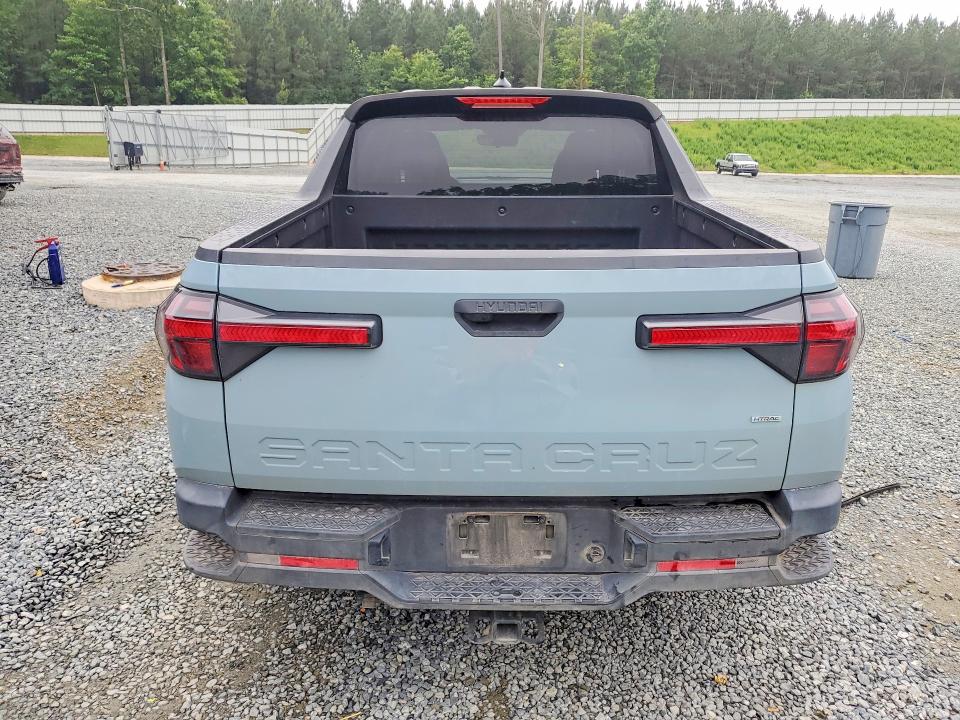 2022 Hyundai Santa cruz VIN 5NTJBDAE4NH026919 COPART salvage auction — FRONT END, Nc - Salvage Certificate Of Title, sold $150 on 2026-07-23 (photo 6)