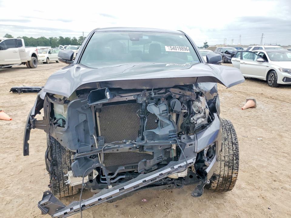 2021 Toyota Tacoma VIN 5TFCZ5AN9MX272599 COPART salvage auction — FRONT END, TX - SALVAGE VEHICLE TITLE (P), sold $9,300 on 2026-07-07 (photo 5)