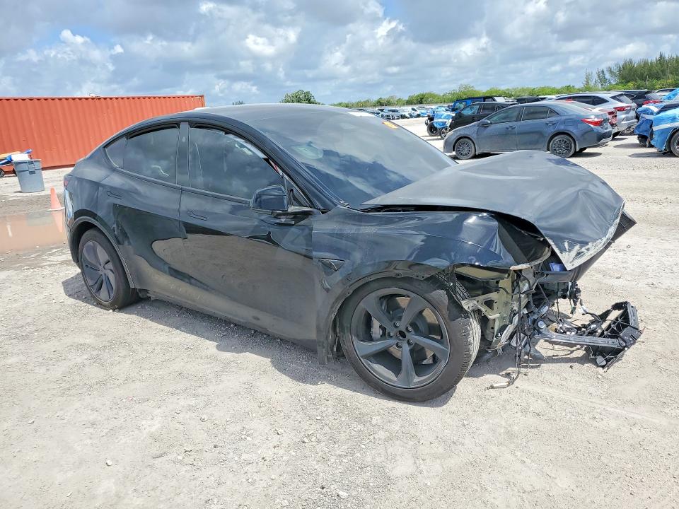 2026 Tesla Model y VIN 7SAYGDED8TA616147 COPART salvage auction — FRONT END, Fl - Cert Of Title Slvg Rebuildable, sold $8,700 on 2026-07-08 (photo 4)