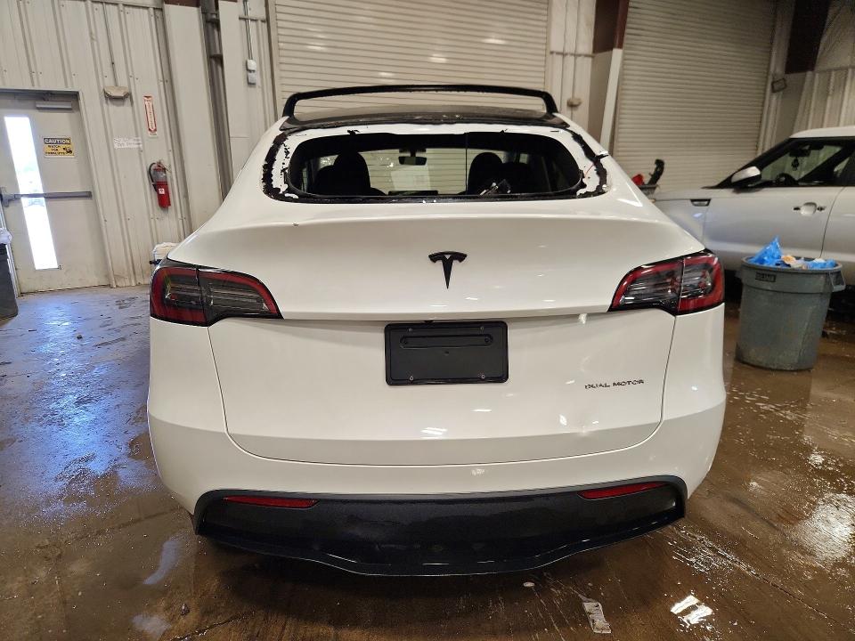 2023 Tesla VIN 7SAYGDEE9PF714007 COPART salvage auction — HAIL, Salvage Title, sold $12,000 on 2026-07-20 (photo 6)