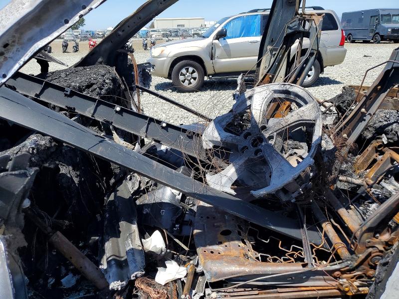 2026 Tesla Model y VIN 7SAYGDEE5TF341283 COPART salvage auction — BURN, Ca - Non-Repairable Vehicle Cert, sold $10 on 2026-07-16 (photo 7)
