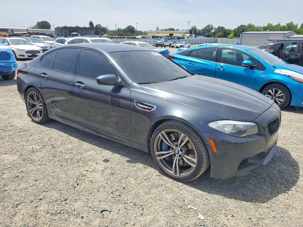2013 BMW M5 VIN WBSFV9C59DD095852 COPART salvage auction — Minor Dent/Scratches, CA - DIS/DLR/EXP ONLY CLEAN TITLE, sold $8,800 on 2026-07-03 (photo 4)