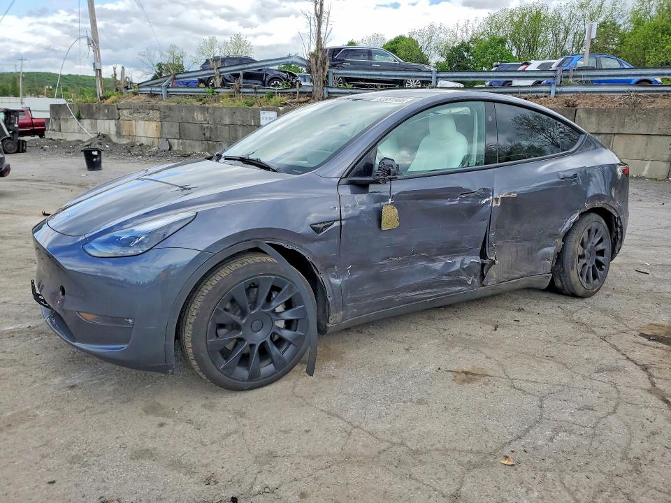 2023 Tesla Model y VIN 7SAYGDEE6PF868433 COPART salvage auction — SIDE, NY - MV-907A SALVAGE CERTIFICATE, sold $7,500 on 2026-07-28 (photo 1)