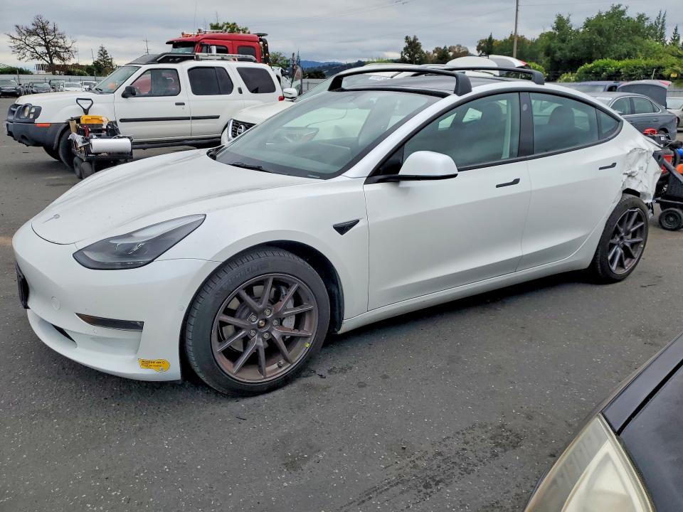 2022 Tesla Model 3 VIN 5YJ3E1EBXNF180630 COPART salvage auction — REAR END, Ca - Salvage Certificate, sold $8,800 on 2026-07-14 (photo 1)
