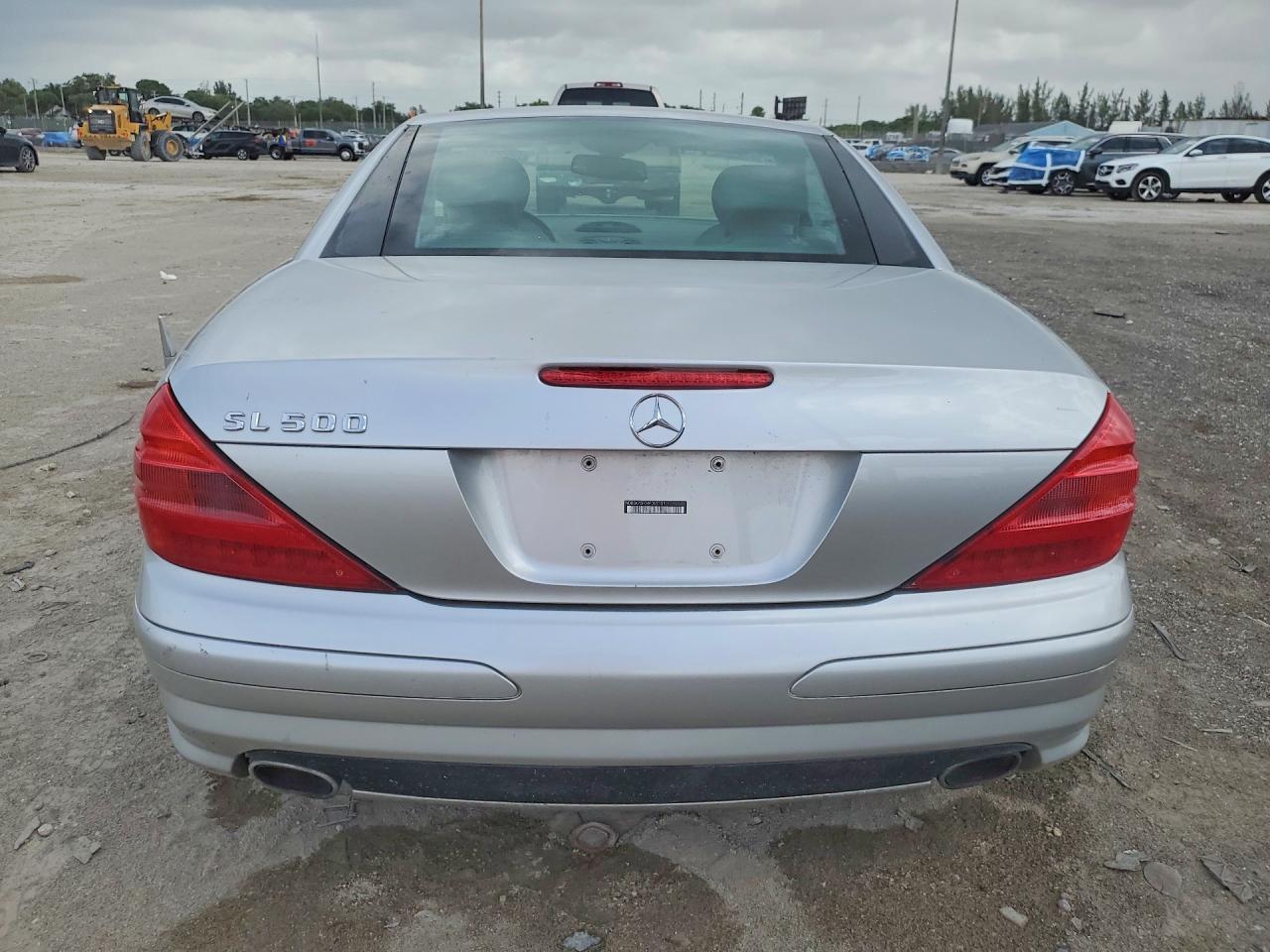 2004 Mercedes-Benz SL-Class VIN WDBSK75F04F065151 COPART salvage auction — Minor Dent/Scratches, FL - CERT OF TITLE-REBUILT, sold $400 on 2026-06-30 (photo 6)