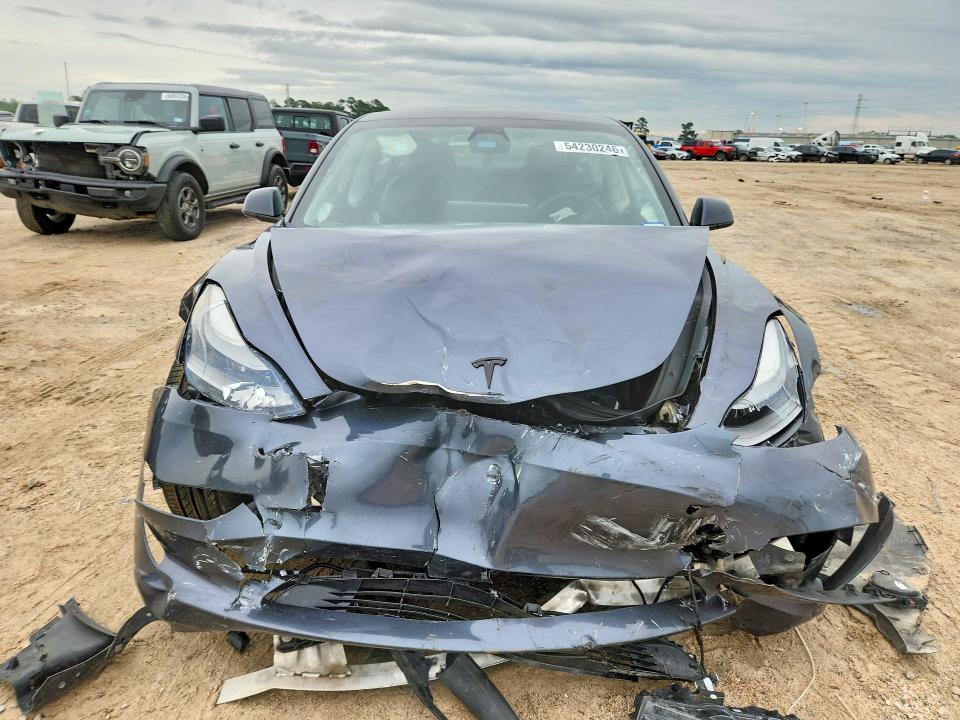 2023 Tesla VIN 5YJ3E1EC8PF509904 COPART salvage auction — FRONT END, Tx - Salvage Vehicle Title, sold $2,700 on 2026-07-24 (photo 5)