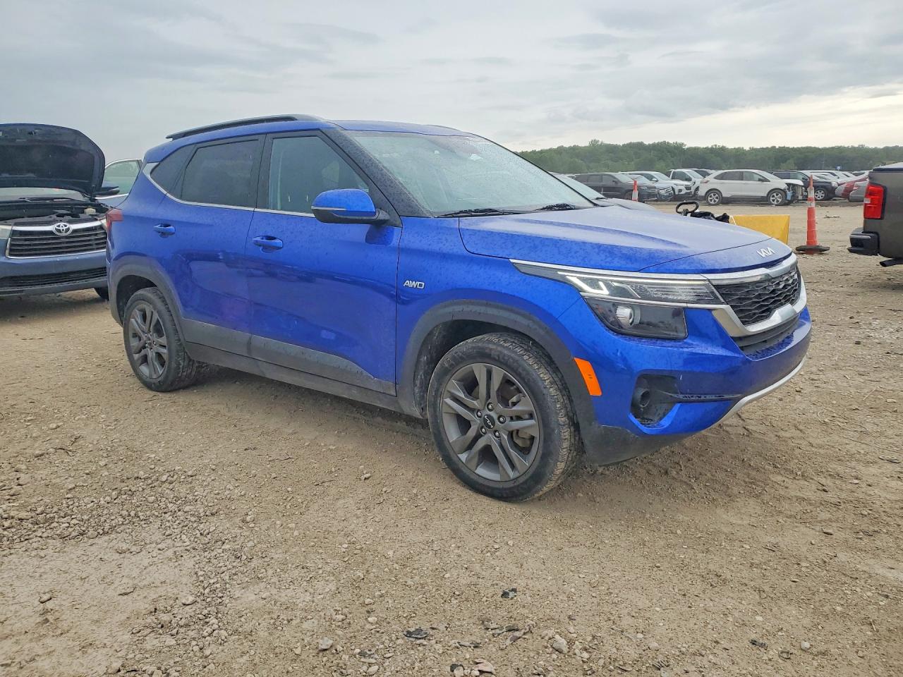 2023 Kia Seltos VIN KNDEUCAA2P7426311 COPART salvage auction — Hail, KS - CERT OF TITLE-SALVAGE, sold $8,400 on 2026-07-09 (photo 4)