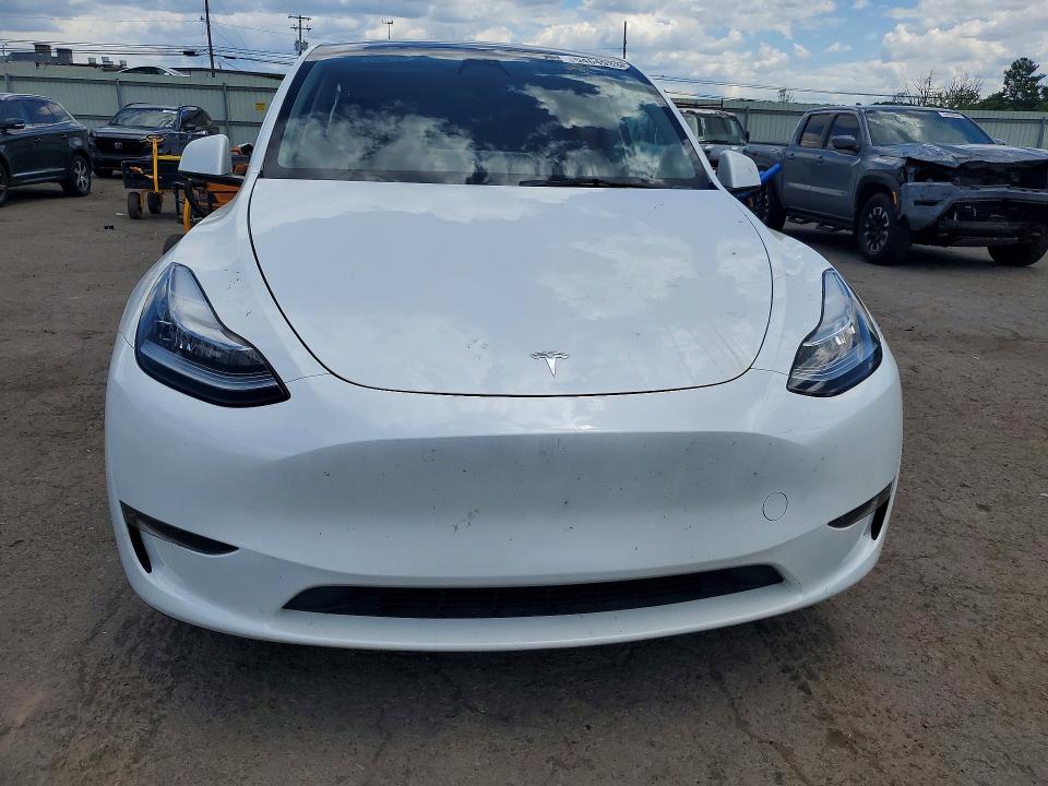 2023 Tesla Model y VIN 7SAYGDEE9PA053379 COPART salvage auction — SIDE, Pa - Certificate Of Salvage, sold $12,900 on 2026-07-02 (photo 5)