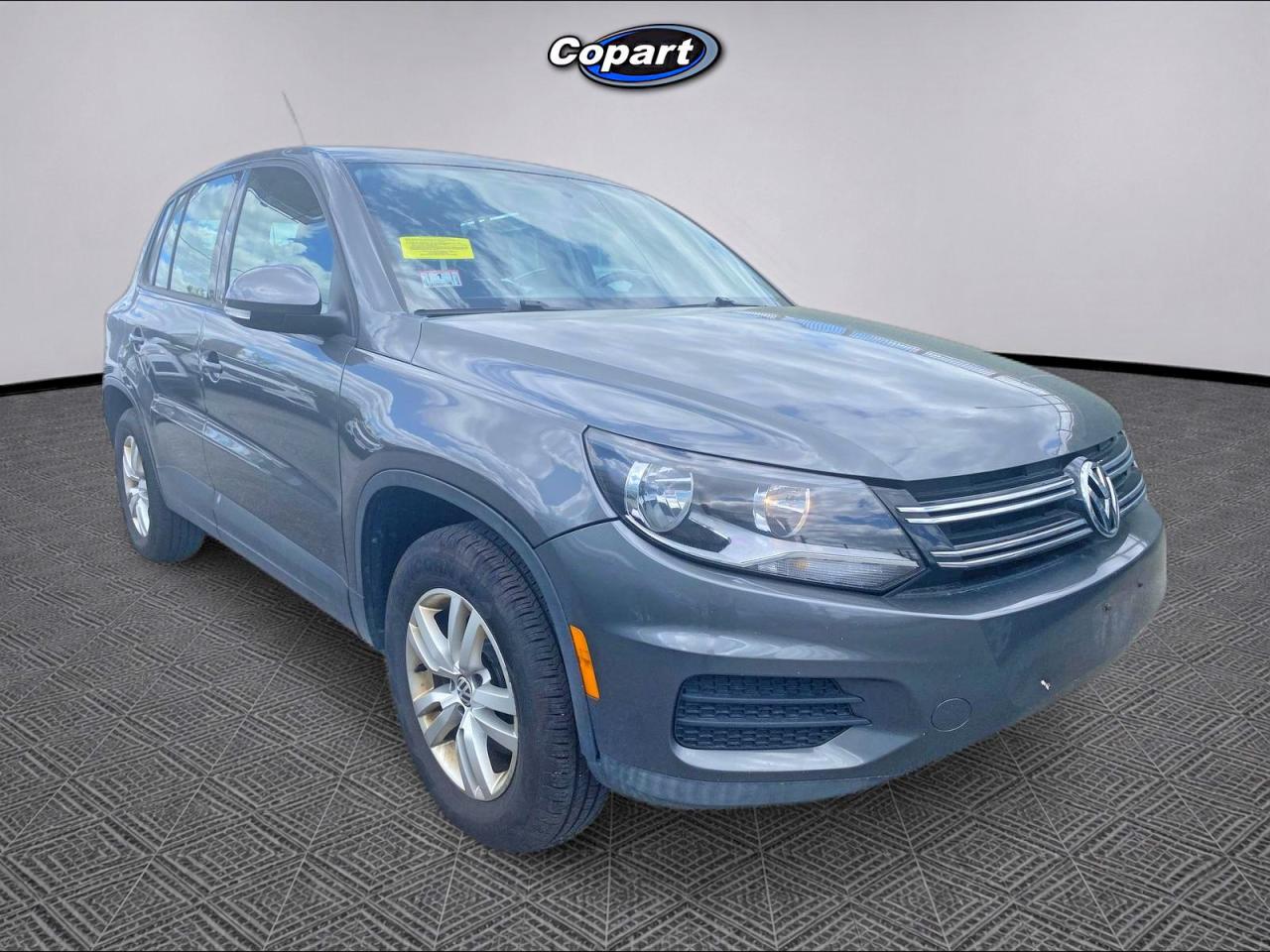 2013 Volkswagen Tiguan VIN WVGBV3AXXDW582615 COPART salvage auction — Normal Wear, MD - CERTIFICATE OF TITLE (P), sold $425 on 2026-07-01 (photo 1)