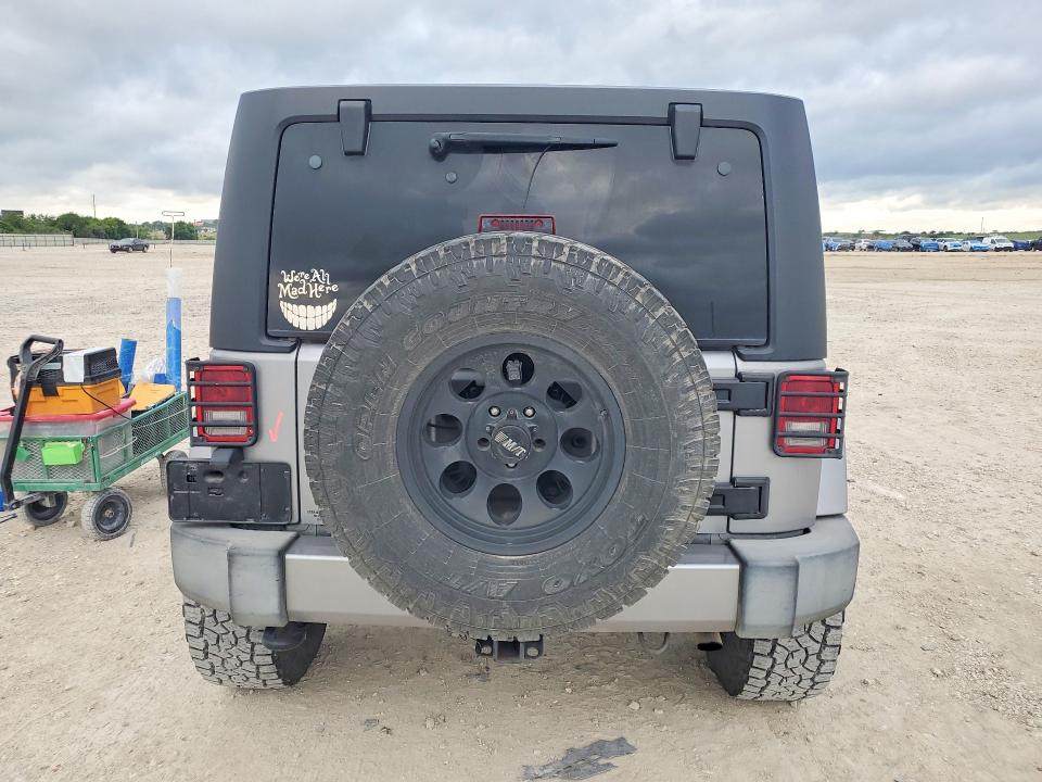 2016 Jeep Wrangler / VIN 1C4BJWEG4GL155500 COPART salvage auction — SIDE, Tx - Salvage Vehicle Title, sold $9,800 on 2026-07-09 (photo 6)