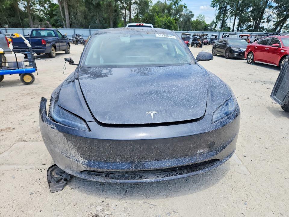 2025 Tesla Model 3 VIN 5YJ3E1EA5SF987947 COPART salvage auction — ROLLOVER, Fl - Cert Of Title Slvg Rebuildable, sold $9,200 on 2026-07-07 (photo 5)
