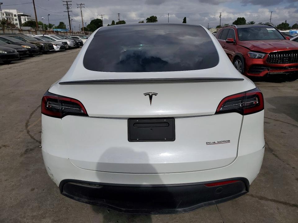 2023 Tesla Model y VIN 7SAYGDEF5PF738880 COPART salvage auction — FRONT END, Az - Dis/Dlr/Exp Only Salvage Title, sold $12,600 on 2026-07-27 (photo 6)