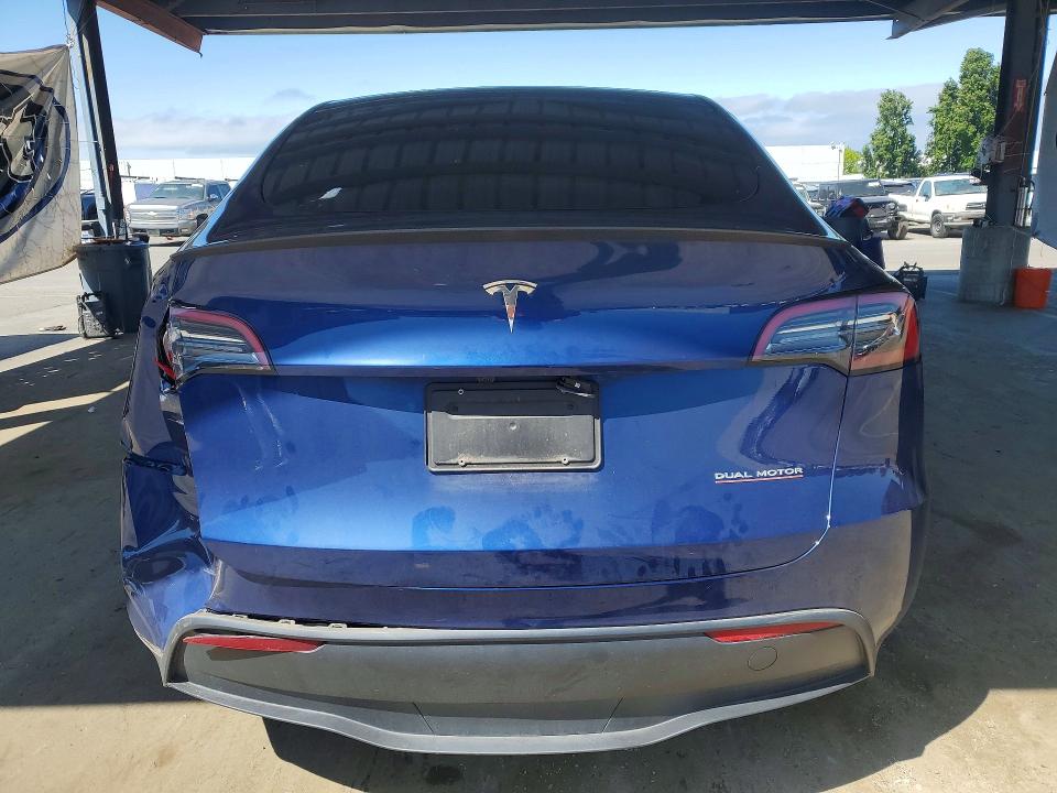 2023 Tesla Model y VIN 7SAYGDEF3PF906287 COPART salvage auction — REAR END, Ca - Salvage Certificate, sold $13,500 on 2026-07-02 (photo 6)