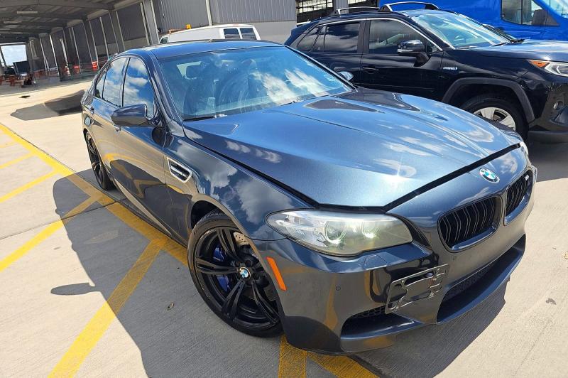 2016 BMW M5 VIN WBSFV9C55GD595740 COPART salvage auction — NORMAL WEAR, Tx - Certificate Of Title (P), sold $11,700 on 2026-07-09 (photo 1)
