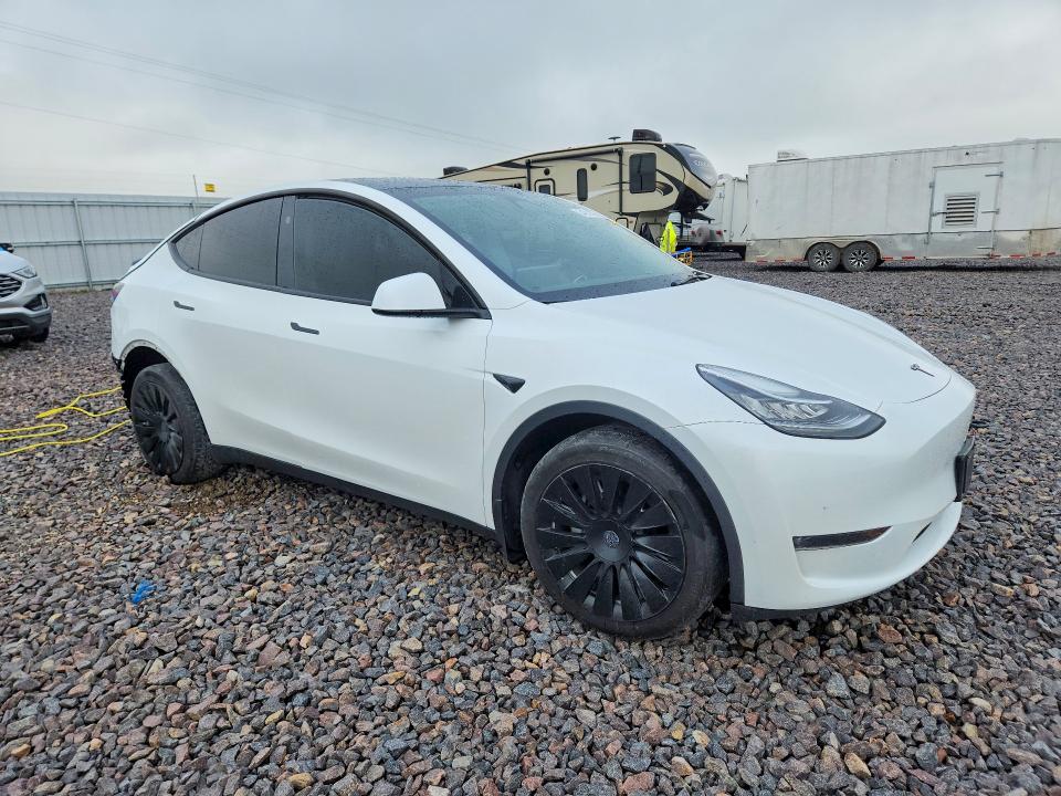 2023 Tesla Model y VIN 7SAYGDEE7PA141234 COPART salvage auction — REAR END, Mo - Salvage Certificate Of Title, sold $14,500 on 2026-07-27 (photo 4)