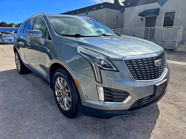 2020 Cadillac Xt5 VIN 1GYKNDRS7LZ196339 COPART salvage auction — SIDE, Fl - Certificate Of Destruction (P), sold $9,400 on 2026-07-28 (photo 4)