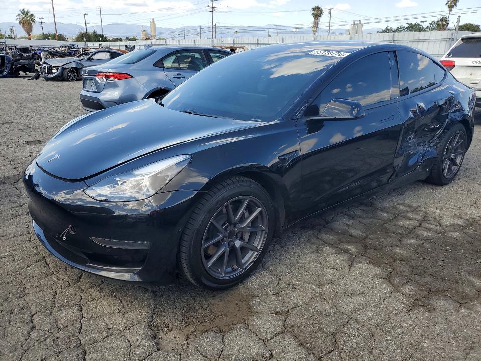 2021 Tesla Model 3 VIN 5YJ3E1EAXMF943011 COPART salvage auction — SIDE, Ca - Salvage Certificate, sold $5,600 on 2026-07-16 (photo 1)