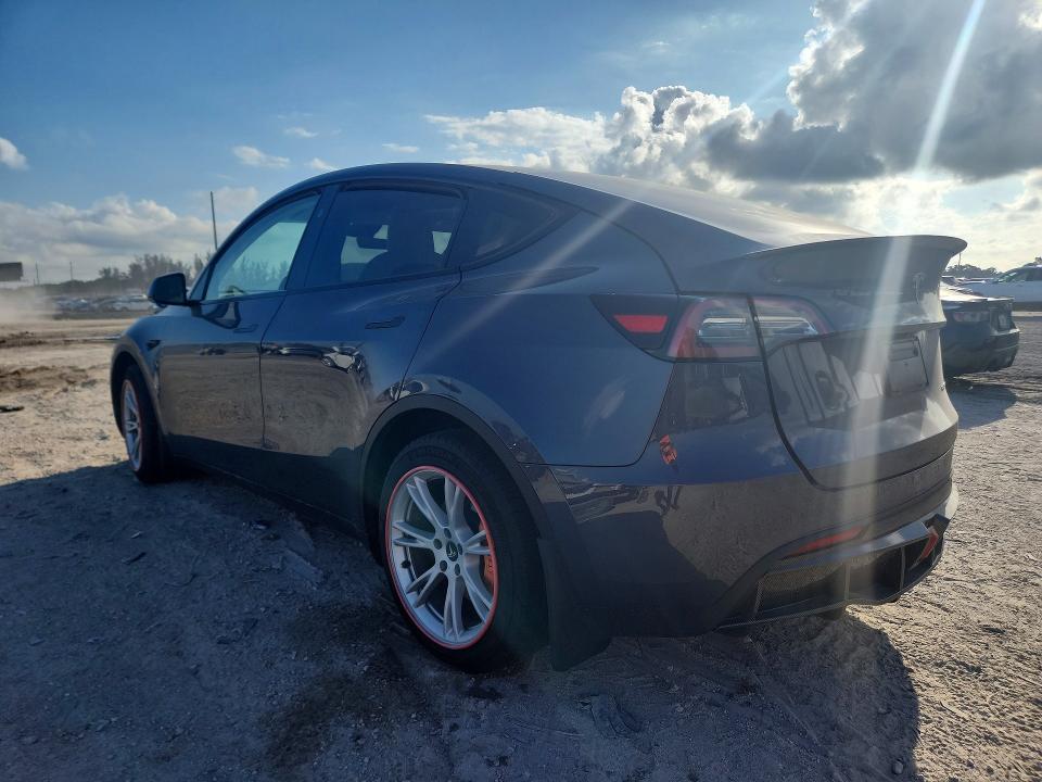 2023 Tesla VIN 7SAYGDEE5PA161434 COPART salvage auction — SIDE, FL - CERT OF TITLE SLVG REBUILDABLE, sold $9,700 on 2026-07-02 (photo 2)