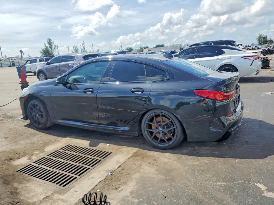 2021 BMW M2 VIN WBA13AL04M7G62156 COPART salvage auction — SIDE, Fl - Cert Of Title Slvg Rebuildable, sold $6,100 on 2026-08-19 (photo 2)