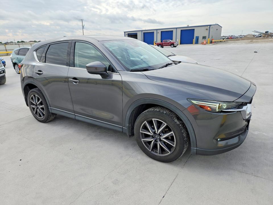 2017 Mazda Cx-5 VIN JM3KFADL9H0179823 COPART salvage auction — MINOR DENT/SCRATCHES, Tx - Salvage Vehicle Title, sold $2,600 on 2026-07-17 (photo 4)