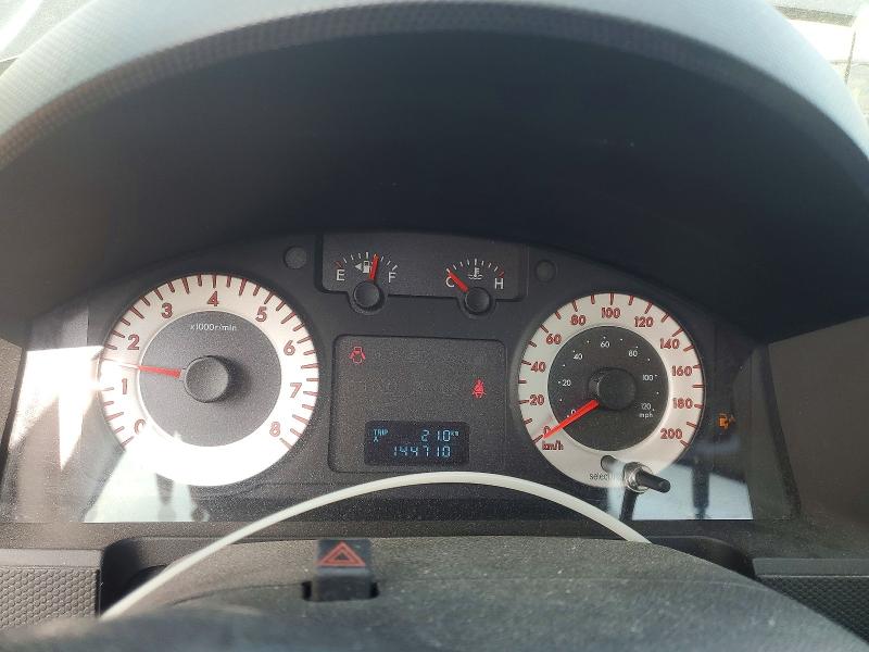 2011 Mazda Tribute VIN 4F2CY0C71BKM00946 COPART salvage auction — MINOR DENT/SCRATCHES, On - Permit No Brand - Unfit, sold $750 on 2026-07-03 (photo 9)