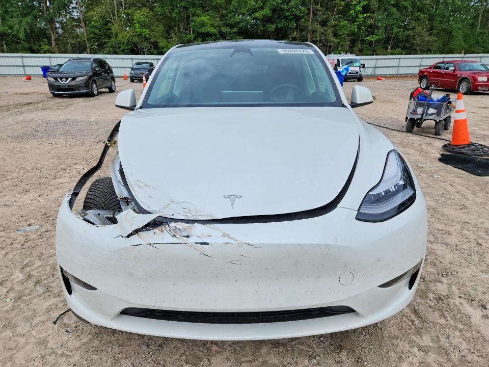 2023 Tesla VIN 7SAYGDEE4PF613022 COPART salvage auction — FRONT END, Nc - Salvage Certificate Of Title, sold $2,100 on 2026-07-31 (photo 5)