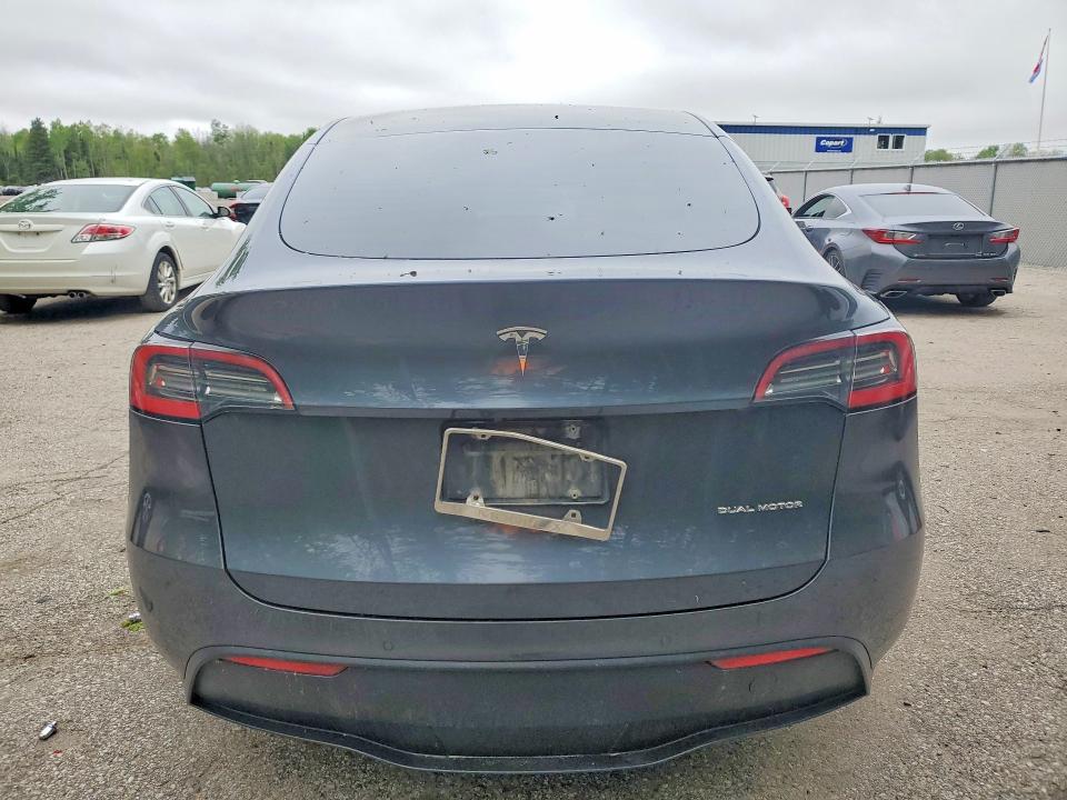 2021 Tesla Model y VIN 5YJYGAEE6MF131577 COPART salvage auction — FRONT END, ON - PERMIT NO BRAND - UNFIT, sold $6,600 on 2026-07-21 (photo 6)