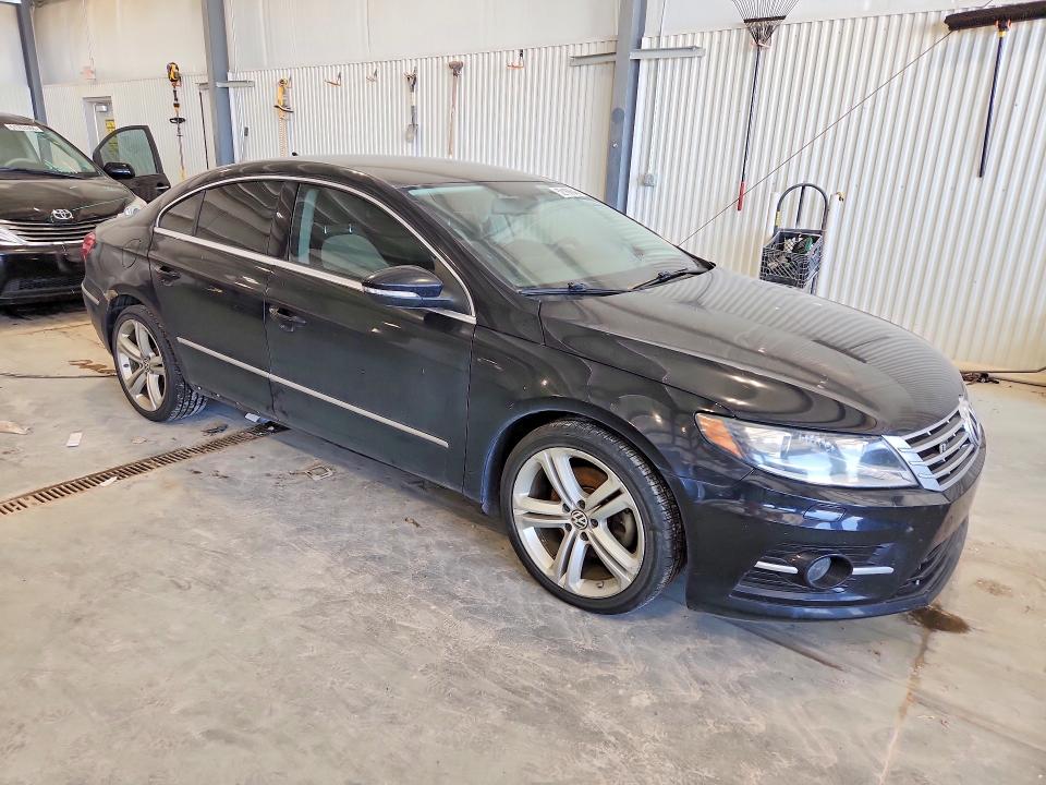 2014 Volkswagen VIN WVWBP7AN0EE533015 COPART salvage auction — NORMAL WEAR, Ne - Certificate Of Title, sold $675 on 2026-07-07 (photo 4)