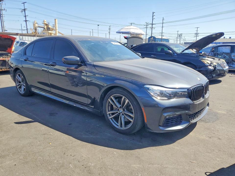 2018 BMW 7er VIN WBA7J2C5XJG938446 COPART salvage auction — REAR END, Ca - Salvage Certificate, sold $10,000 on 2026-07-29 (photo 4)