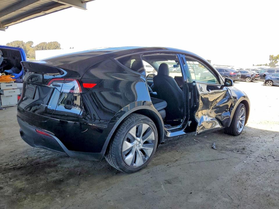 2023 Tesla Model y VIN 7SAYGDEE2PF892342 COPART salvage auction — SIDE, CA - SALVAGE CERTIFICATE, sold $7,800 on 2026-07-21 (photo 3)