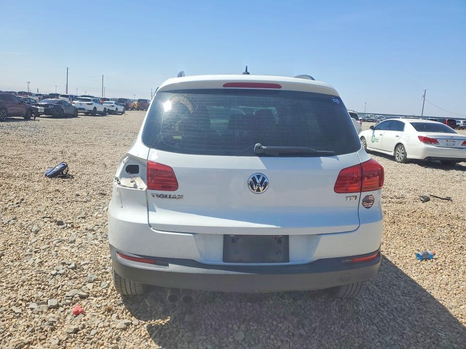 2016 Volkswagen Tiguan VIN WVGAV7AX5GW530705 COPART salvage auction — SIDE, Tx - Salvage Vehicle Title, sold $2,100 on 2026-07-07 (photo 6)