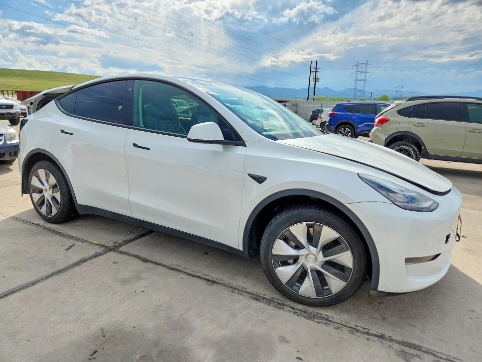 2022 Tesla Model y VIN 7SAYGAEE1NF515089 COPART salvage auction — REAR END, Co - Public - Salvage Title, sold $9,600 on 2026-07-29 (photo 4)