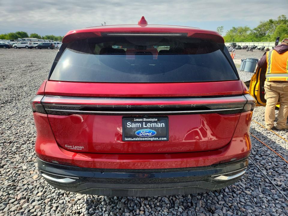 2024 Lincoln Nautilus VIN 5LMPJ8JAXRJ879332 COPART salvage auction — SIDE, Il - Salvage Certificate, sold $18,300 on 2026-07-27 (photo 6)