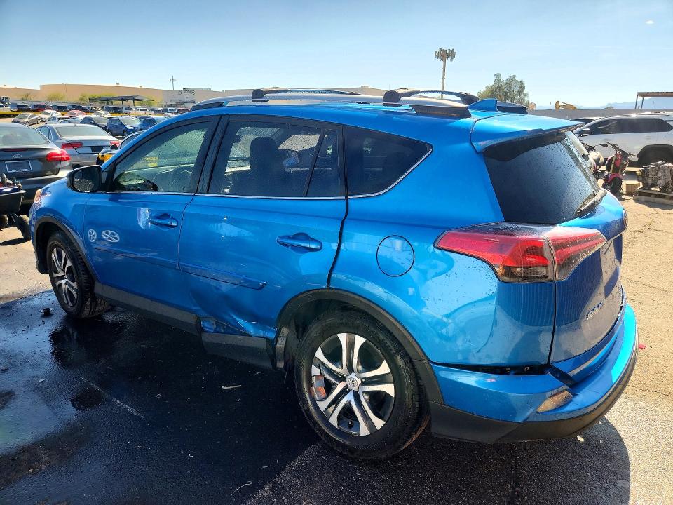 2017 Toyota Rav 4 VIN JTMZFREV5HD094539 COPART salvage auction — SIDE, Nv - Salvage Title, sold $1,750 on 2026-07-07 (photo 2)