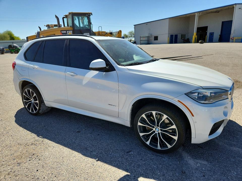 2018 BMW X5 VIN 5UXKR6C50J0U14212 COPART salvage auction — REAR END, AZ - CERT OF TITLE - SALVAGE, sold $6,300 on 2026-07-17 (photo 4)