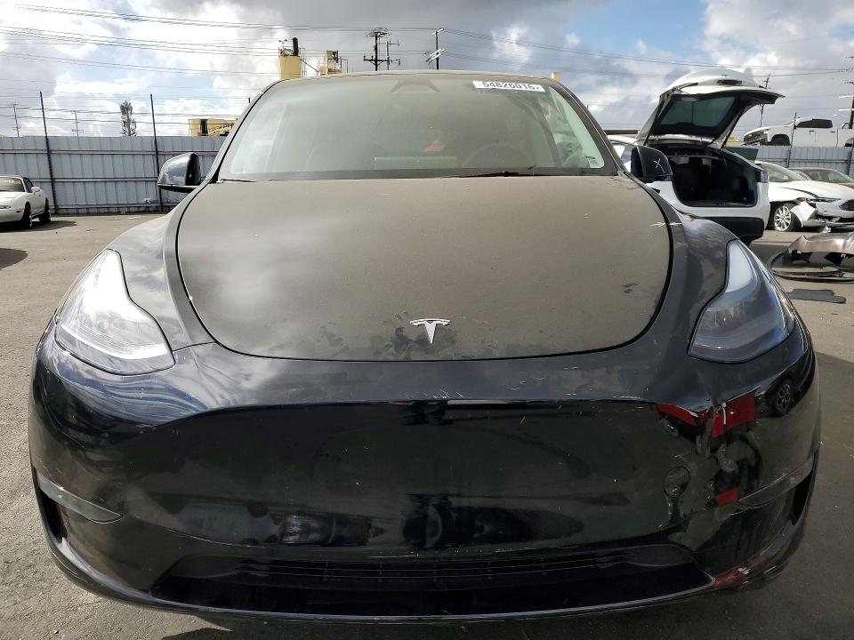 2023 Tesla Model y VIN 7SAYGDEE3PA178068 COPART salvage auction — SIDE, Salvage Title, sold $12,100 on 2026-07-29 (photo 5)