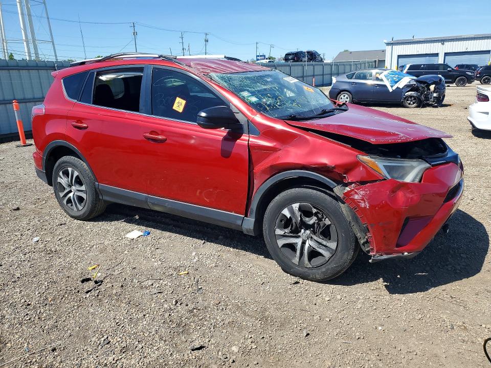 2016 Toyota VIN JTMZFREV5GJ065932 COPART salvage auction — ROLLOVER, Il - Salvage Certificate, sold $3,450 on 2026-07-08 (photo 4)