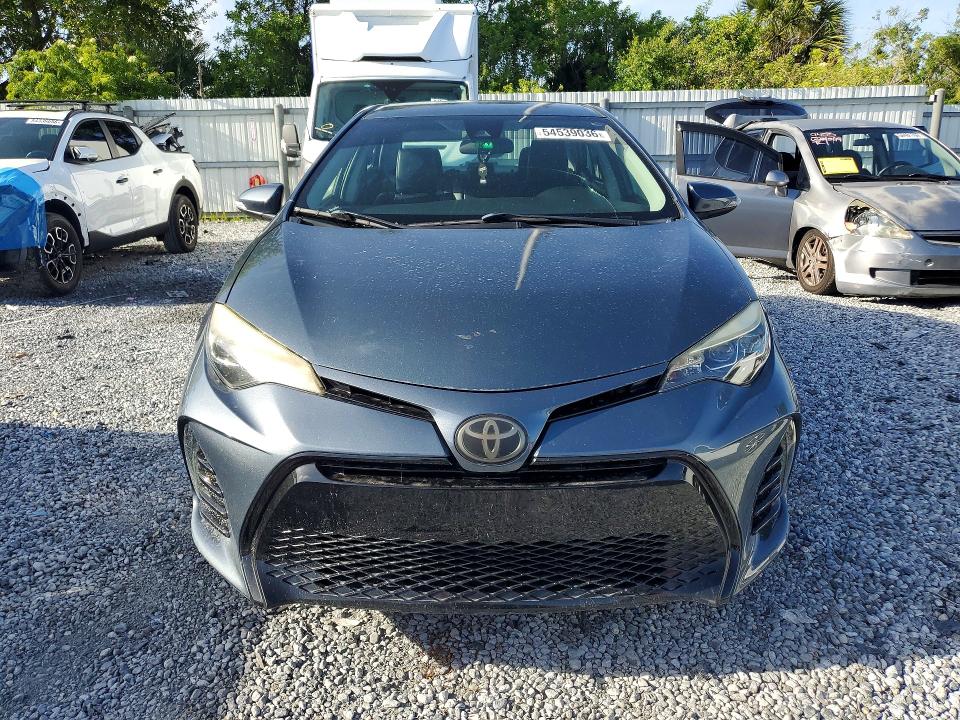 2018 Toyota Corolla VIN 5YFBURHEXJP842546 COPART salvage auction — SIDE, Fl - Cert Of Title Slvg Rebuildable, sold $3,250 on 2026-07-17 (photo 5)