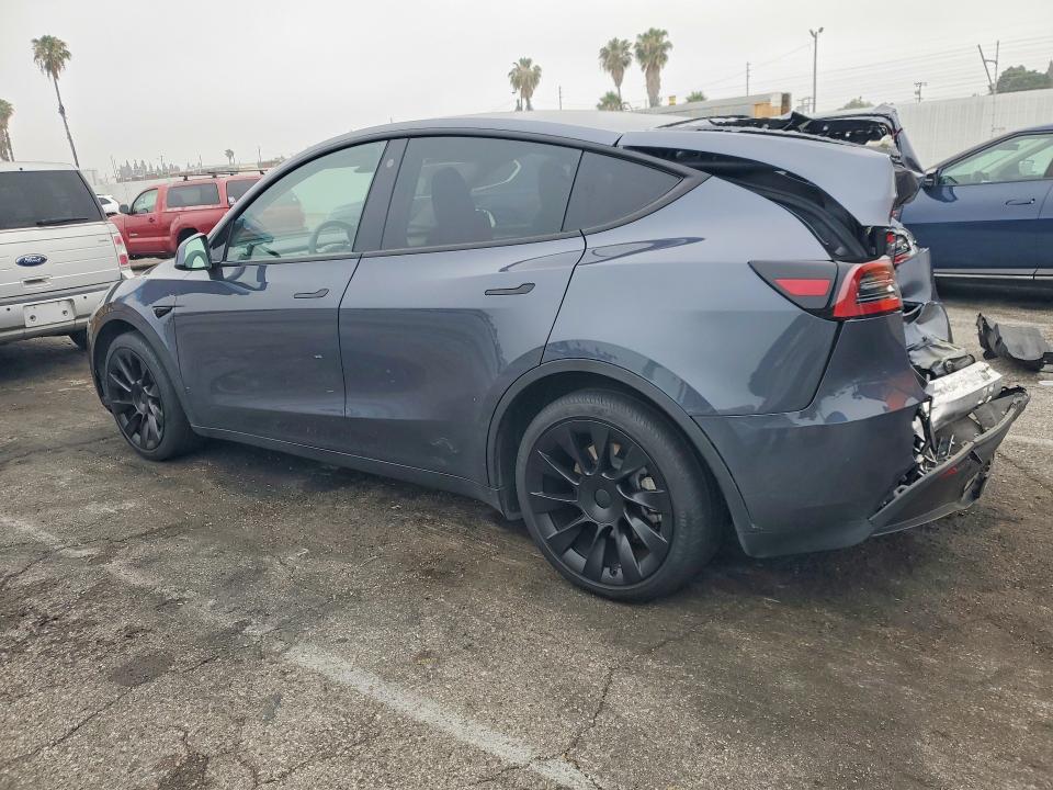 2023 Tesla Model y VIN 7SAYGDEE9PA113967 COPART salvage auction — REAR END, Ca - Salvage Certificate, sold $7,500 on 2026-07-17 (photo 2)