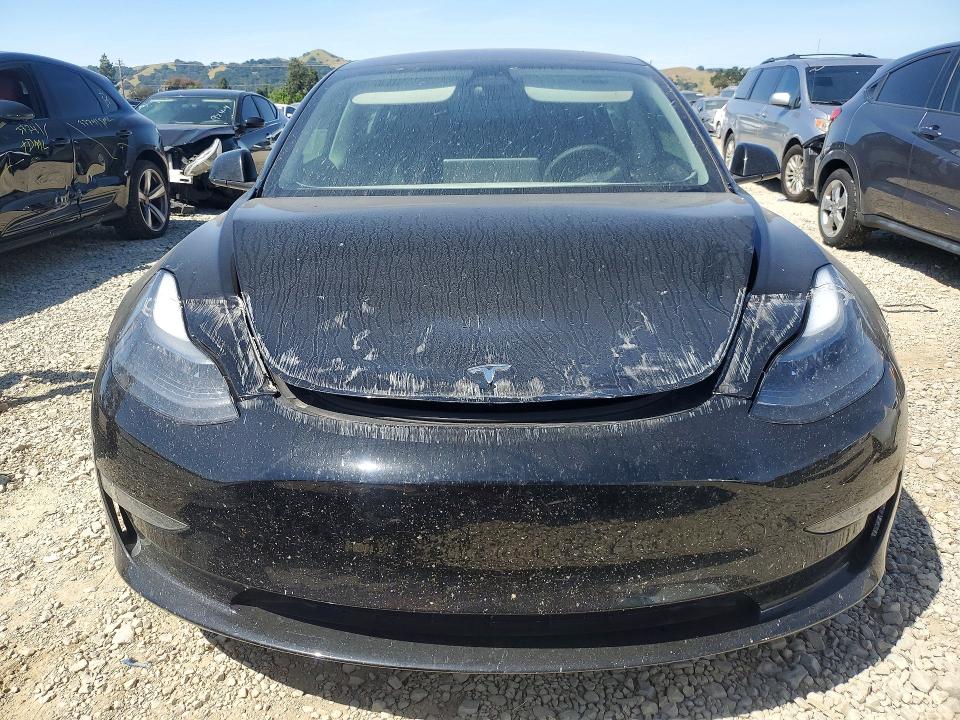 2023 Tesla Model 3 VIN 5YJ3E1EA7PF590263 COPART salvage auction — REAR END, Ca - Salvage Certificate, sold $6,600 on 2026-07-07 (photo 5)