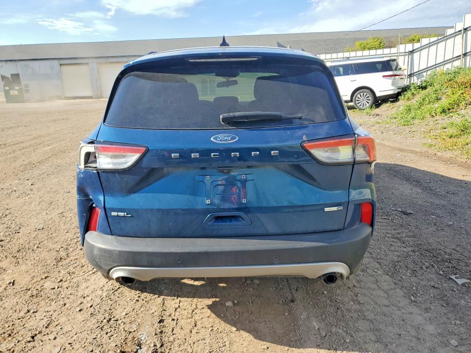 2020 Ford Escape VIN 1FMCU9H61LUB63909 COPART salvage auction — REAR END, Mi - Dealer Only Clean Title, sold $4,250 on 2026-07-22 (photo 6)
