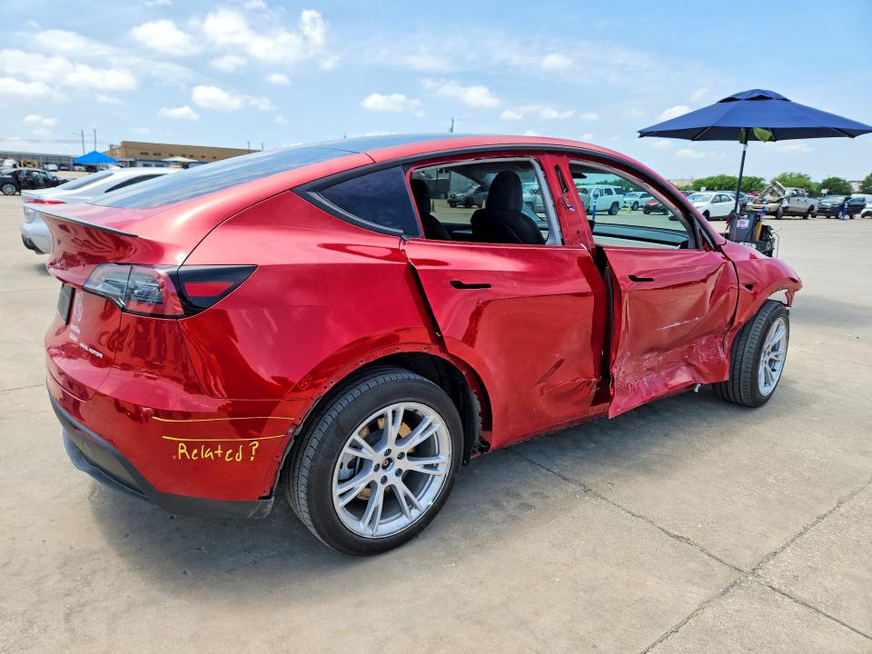 2023 Tesla VIN 7SAYGDEE8PA088690 COPART salvage auction — SIDE, Tx - Certificate Of Title, sold $13,700 on 2026-07-09 (photo 3)
