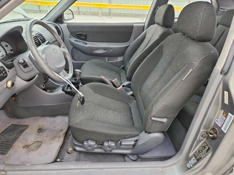 2005 Hyundai Accent VIN KMHCG35C75U322188 COPART salvage auction — HAIL, Tx - Certificate Of Title, sold $150 on 2026-07-28 (photo 7)