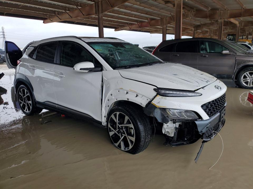 2023 Hyundai Kona VIN KM8K53A32PU982990 COPART salvage auction — ROLLOVER, Tx - Salvage Vehicle Title, sold $2,600 on 2026-07-10 (photo 4)