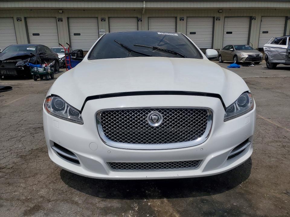 2013 Jaguar VIN SAJWA2G10DLV53383 COPART salvage auction — SIDE, Ky - Certificate Of Title, sold $575 on 2026-07-20 (photo 5)