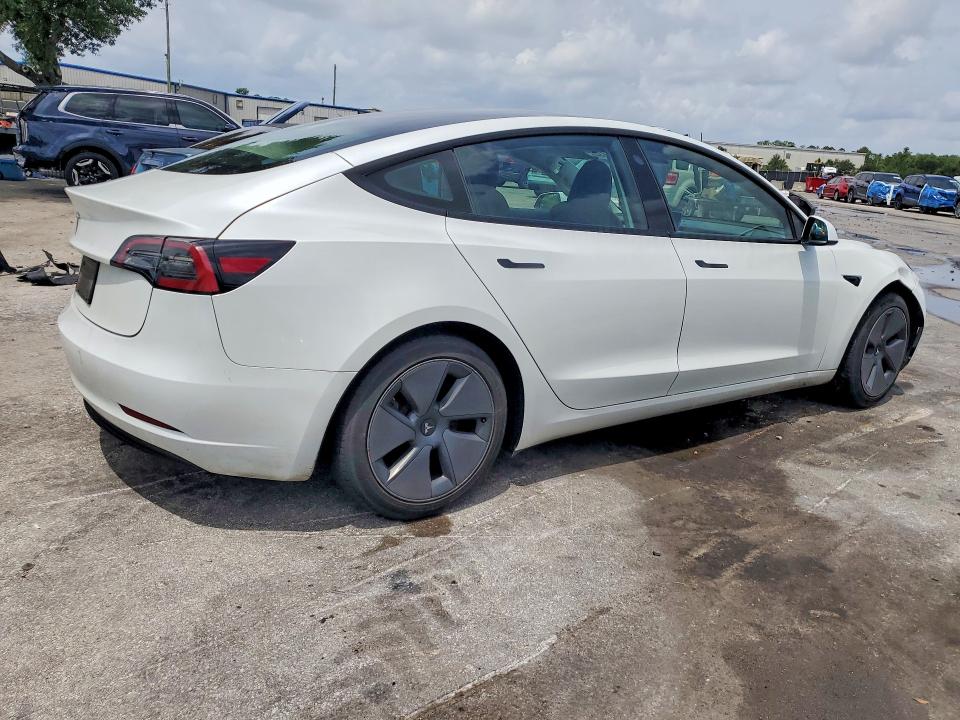 2023 Tesla Model 3 VIN 5YJ3E1EA6PF656060 COPART salvage auction — REAR END, Fl - Cert Of Title Slvg Rebuildable, sold $7,600 on 2026-07-14 (photo 3)
