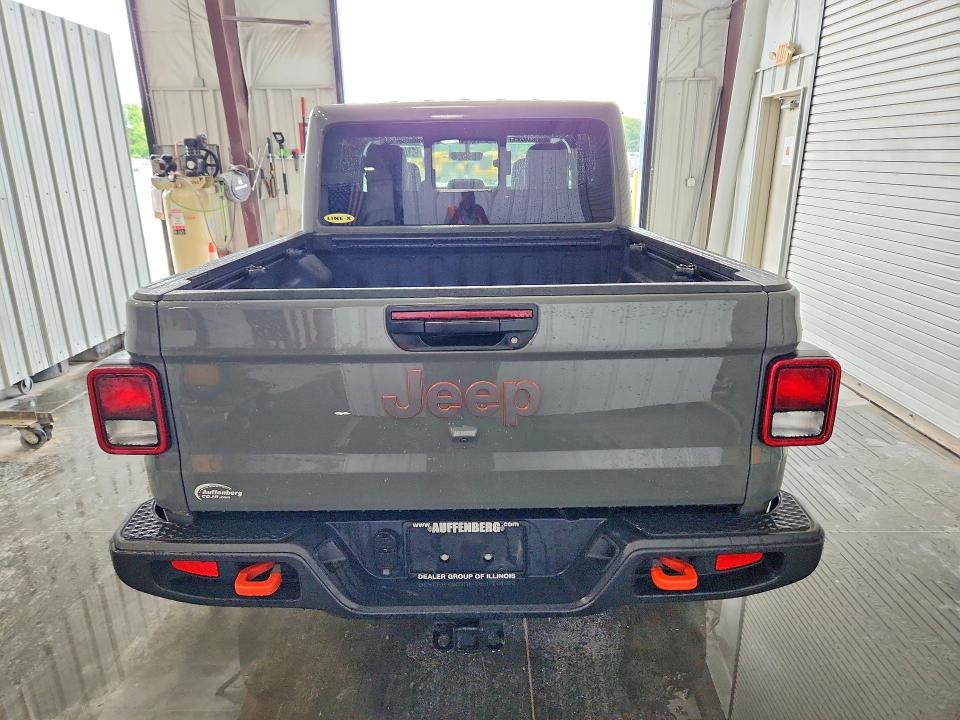 2023 Jeep Gladiator VIN 1C6JJTEG4PL529931 COPART salvage auction — MINOR DENT/SCRATCHES, Il - Certificate Of Title, sold $30,500 on 2026-07-02 (photo 6)