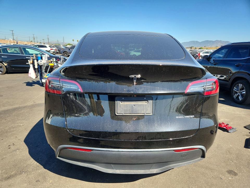 2023 Tesla Model 3 VIN 7SAYGDEE0PA061595 COPART salvage auction — SIDE, Salvage Title, sold $250 on 2026-08-03 (photo 6)